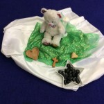 Reception made a prayer focus thinking about our mass. We chose a pebble and thought about ways in which we can be peaceful, we listened to music and then placed our pebble around the prayer table.
